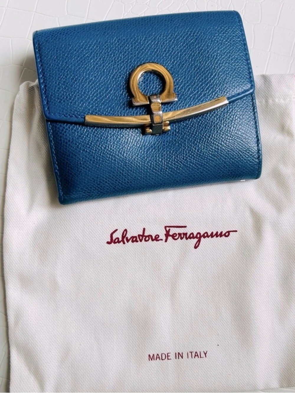 Sarvatore Ferragamo Gancini Double Fold Wallet in pebbled leather in blue color